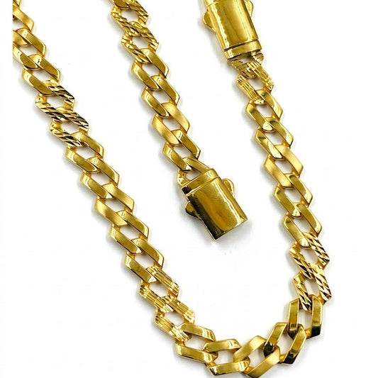 Gold chain necklace with a clasp on a white background
