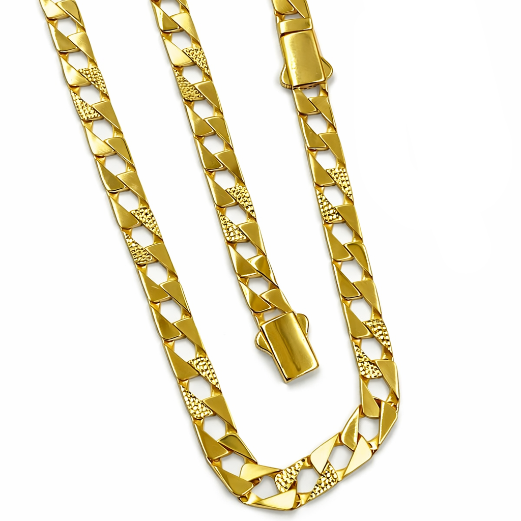 Gold chain necklace on a white background