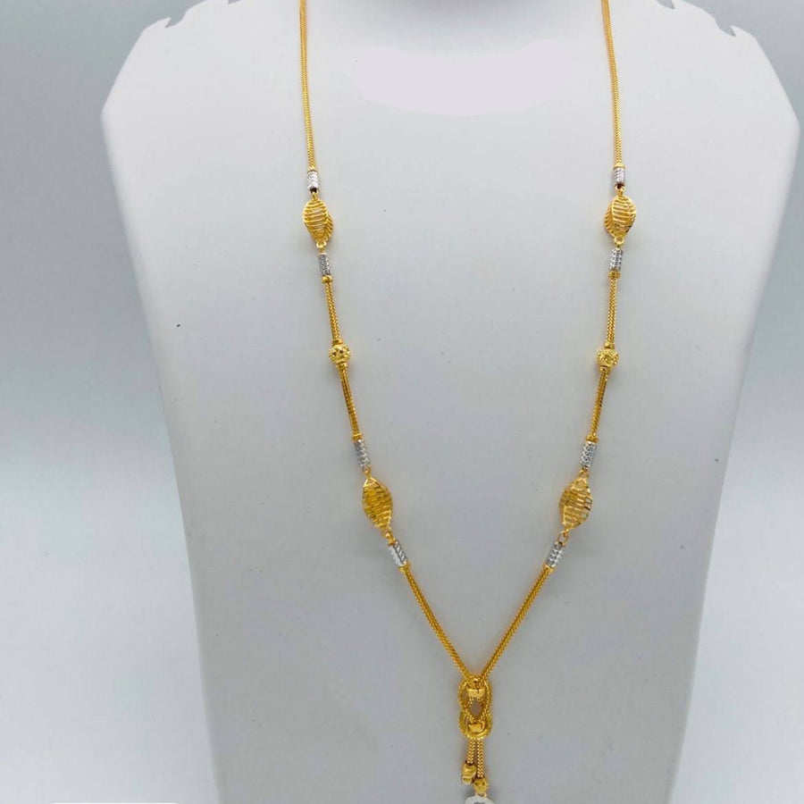 Gold necklace on a mannequin bust with weight and length information.