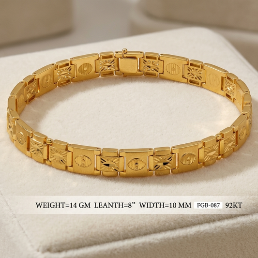 A gold link bracelet displayed on a cream-colored jewelry cushion, with text below showing specifications: WEIGHT=14 GM, LEATH=8" (approx. 20 cm), WIDTH=10 MM, FGB-087, 92KKT.