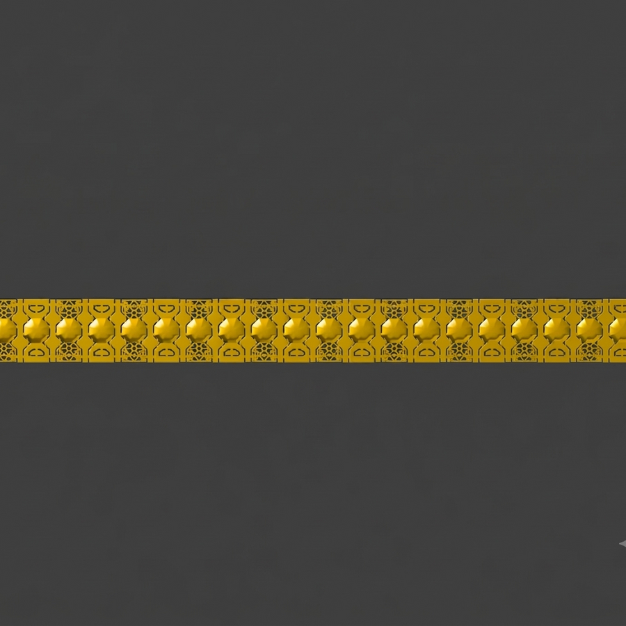 A yellow rectangular strip with multiple circular raised bumps and repeating black printed symbols, shown horizontally on a dark gray background.
