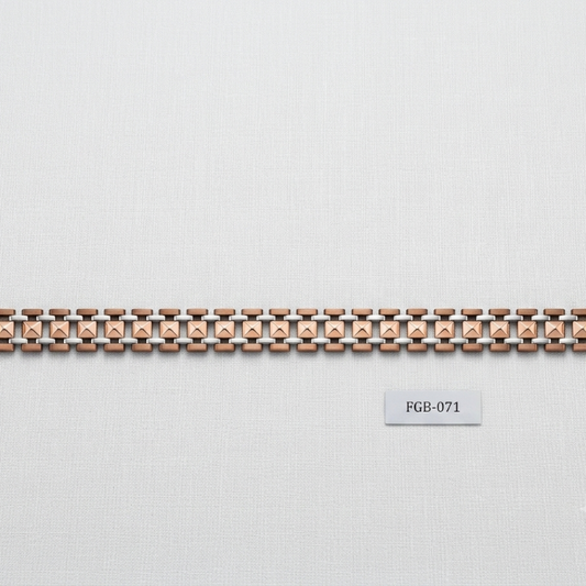 A delicate rose gold chain bracelet with gold-toned end caps and a small label below reading FGB-071, displayed on a light gray textured background.
