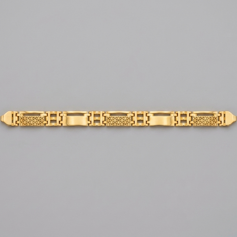 A gold link bracelet with a combination of polished rectangular links and textured geometric patterns, displayed horizontally on a solid gray background.