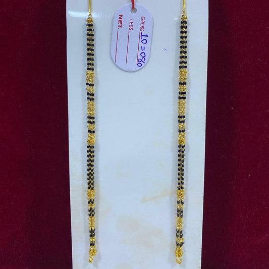 Two beaded necklaces on a white card with a red background