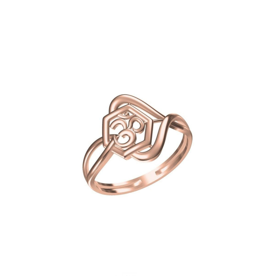A rose gold ring with a geometric, openwork design featuring a stylized heart and circular motif on a clean white background. A small code label 'SILR-8527' and a logo 'DC' are visible at the bottom.