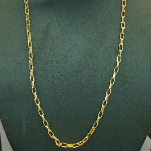 A gold chain necklace displayed on a dark green jewelry bust against a light gray background.