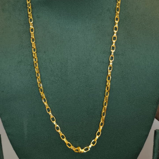 A gold chain necklace displayed on a dark green velvet jewelry bust against a light gray background.
