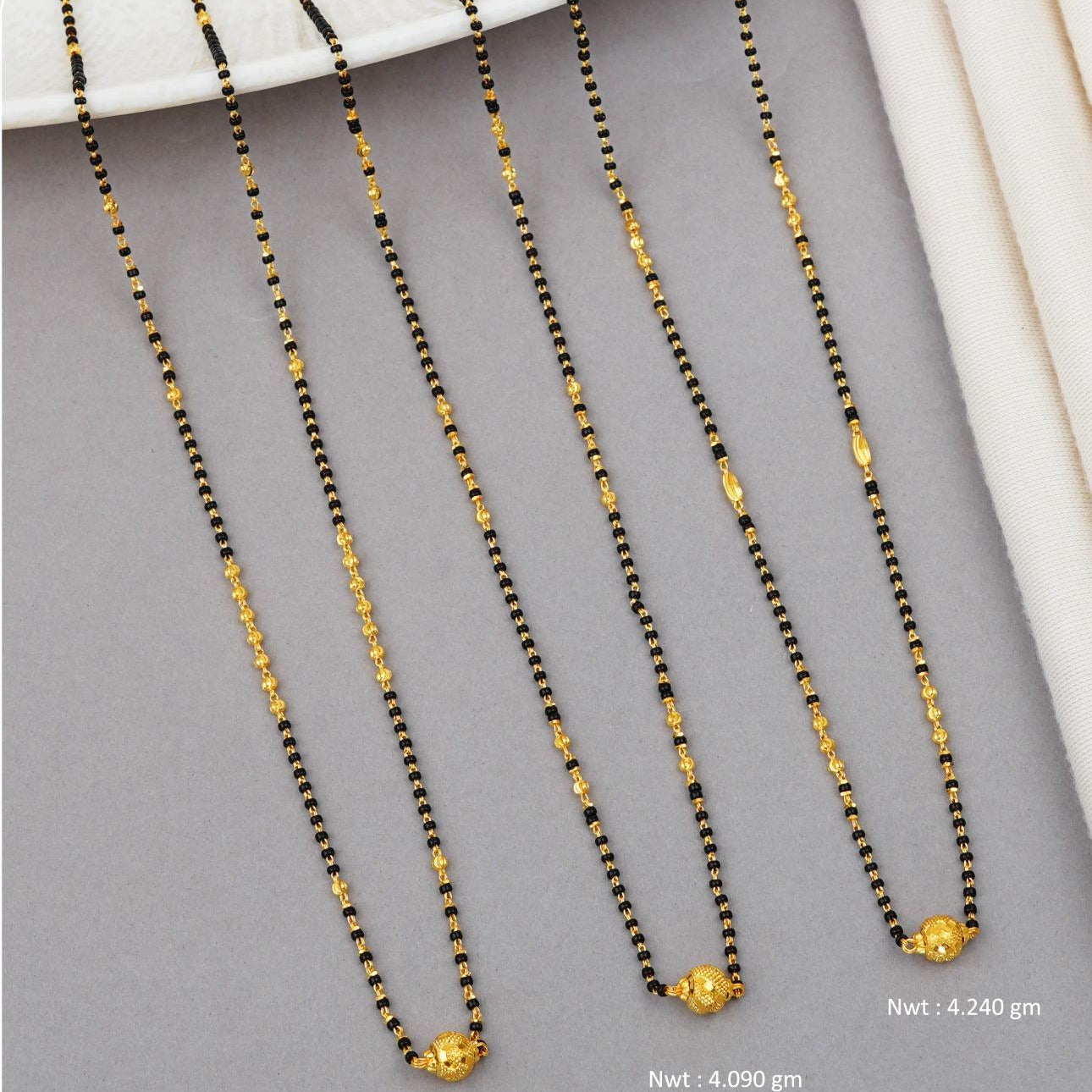 Short Mangalsutra with small pendants