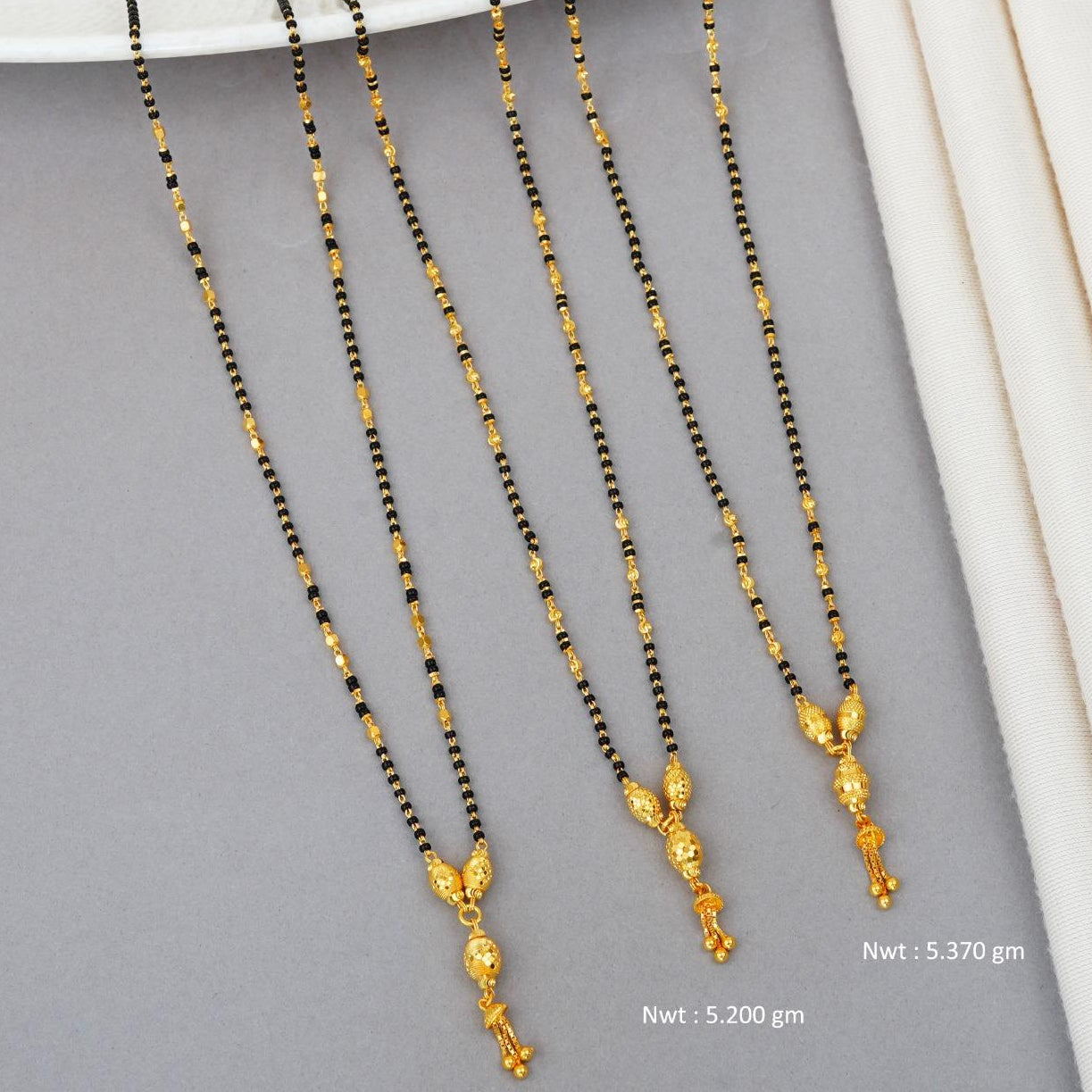 Short Mangalsutra with long pendants