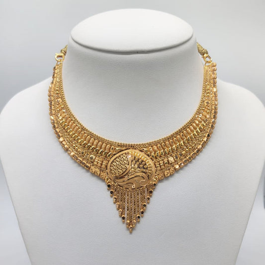 Gold necklace on a mannequin with weight displayed